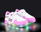 Stylish pink and white party shoes with breathable design and built-in LED lights