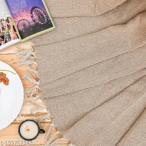 Beige IQ Interior Quotient throw blanket for sofa bed or couch, soft cotton material, breathable, classic diamond pattern, tassels at each corner, 150cm x 125cm size