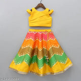 Yellow satin lehenga choli for kids, leheriya pattern, sleeveless, stylish party frock, self-fabric belt, digital floral print