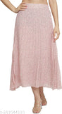 A woman wearing a long pink skirt with white floral print
