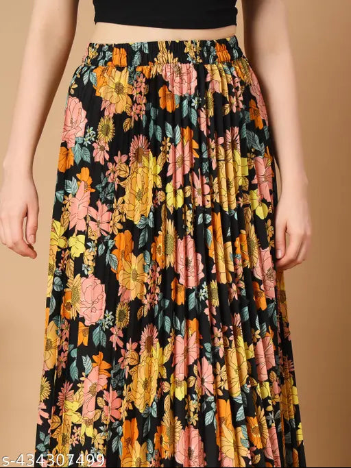Black floral pleated maxi skirt, crepe, printed net, pockets, elegant long design, versatile style for any occasion