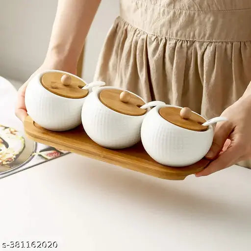 Ceramic serving tray with four condiment containers, salt and pickle jar sets, kitchen storage set