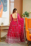 White embroidered net lehenga-choli & dupatta set for women, India. Exquisite traditional style with modern twist