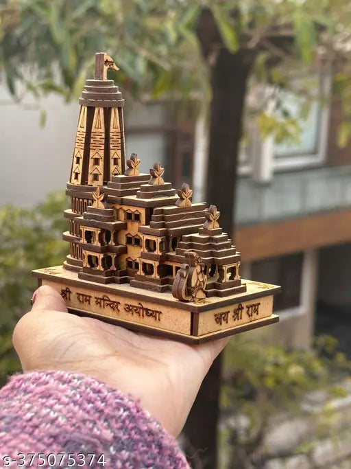 Handcrafted wooden Ram mandir with intricate designs and text, depicts Lord Ram and his temple in Ayodhya