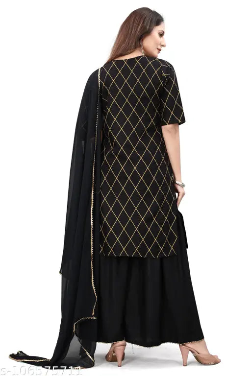 A woman's sleeveless kurta with a gold print, paired with sharara pants and dupatta, black border detailing