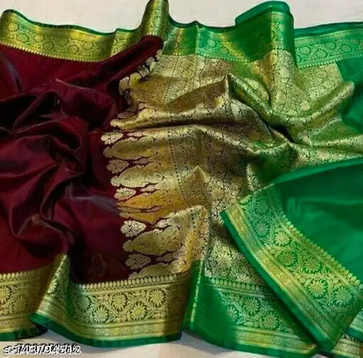 Brightly colored Banarasi silk saree with intricate patterns, red borders, and lace trim