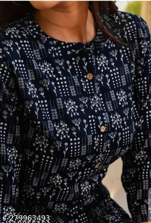 Blue printed short kurta, possibly cotton, with a round neckline and long sleeves