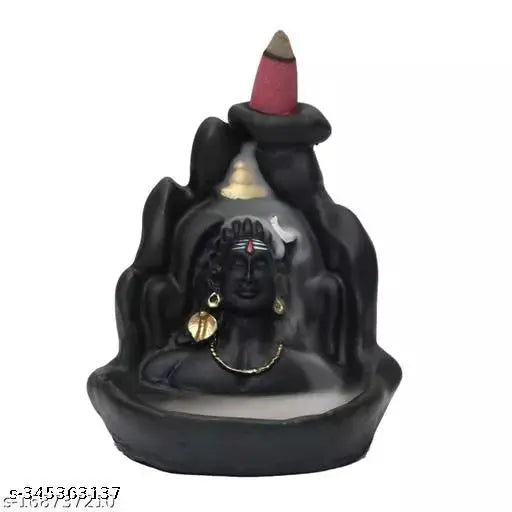 Black ceramic Lord Ganesha statue with a lit candle, free backflow cones included