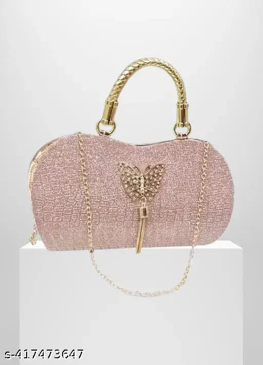 Pink and gold glitter clutch purse with keychain design