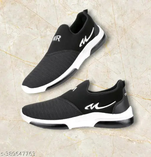 Black running shoe, lightweight, breathable, sole with deep grooves for grip, slip on design, comfortable heel tab for easy wear, ideal for outdoor walking and parks