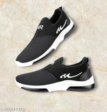 Black running shoe, lightweight, breathable, sole with deep grooves for grip, slip on design, comfortable heel tab for easy wear, ideal for outdoor walking and parks