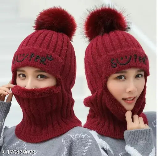 Black wool cap, visor, visor-up version in background; both with pom-poms