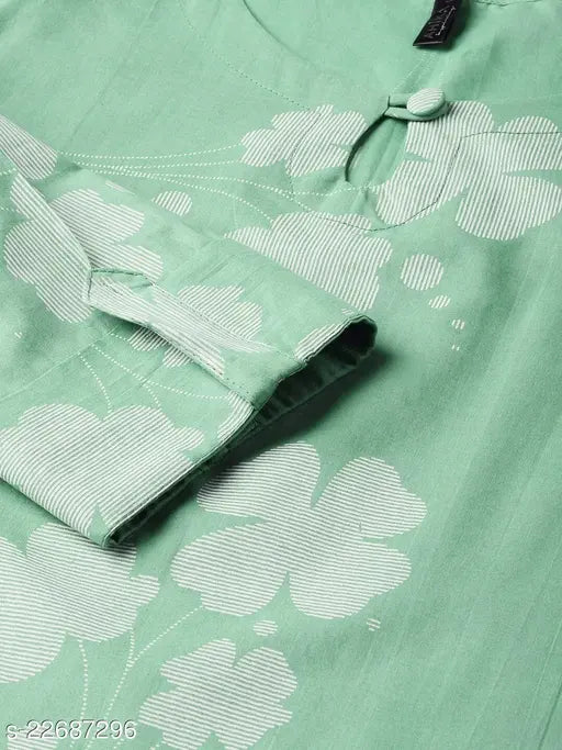 A women's cotton kurta with intricate white floral embroidery