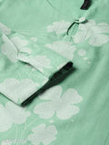 A women's cotton kurta with intricate white floral embroidery