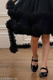 Black ruffled lace dress, high neck, flat shoes