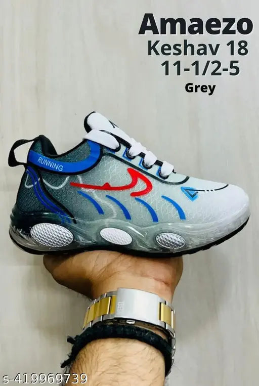 Grey mesh and TPU lace-up sneakers for boys, featuring comfort insoles and casual printed design, ideal for everyday wear. Made in India (size 4.5-13 years)