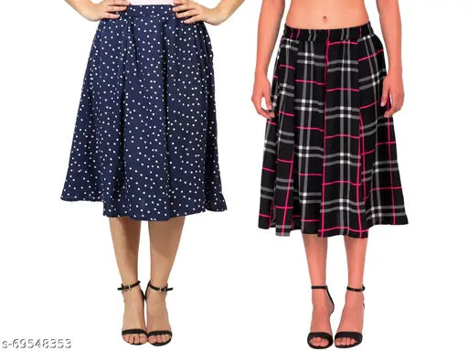 Navy blue polyester skirt with fuchsia print, mid-calf length for women, paired with navy blue paneled top