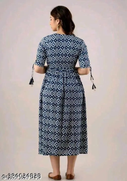 Blue and white patterned knee-length dress with tie at waist