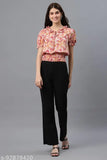 Pink polyester women's top with casual puff sleeves and printed design, short-sleeved fashion on mannequin