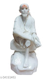 White marble statue of Sai Baba, seated in a traditional meditative posture, adorned with velvet dress and white embroidery