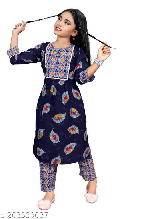 Girls printed rayon kurta set, straight trousers with three-quarter sleeves. Indian children's fashion on display