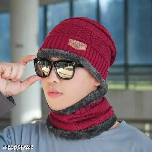 Red and black knit beanie with sunglasses on the face