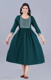 Green churi kameez with white embroidery