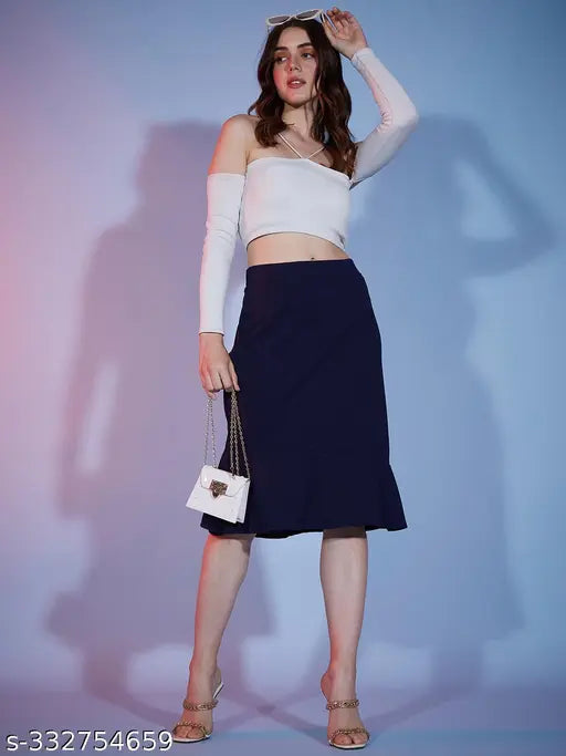 Polyester women's knee-length fish cut skirt, solid net design with ruffle stitch and side short cut. Buynewtrend women's skirt, ideal for crop tops or tank tops