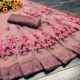 Trendy net saree with heavy embroidery and moti lace border, unstitched silk blouse piece. Formal and traditional Indian attire, perfect for festivals or office wear