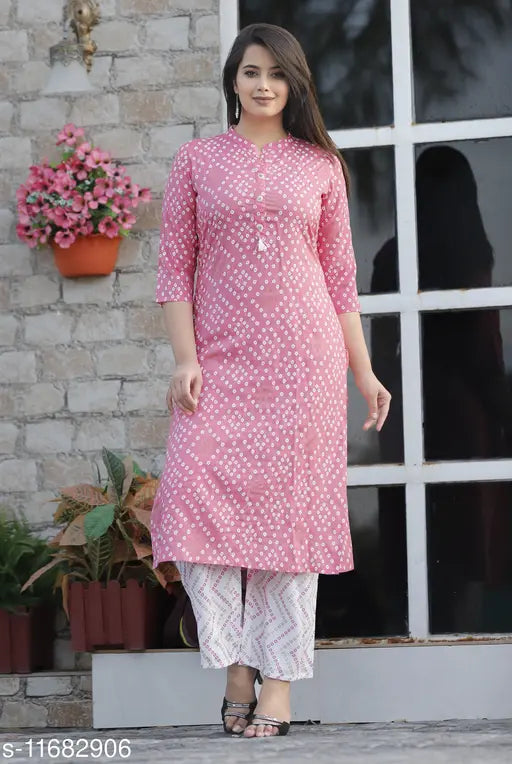 Rayon A-line printed pink kurti with white palazzo, comfortable cotton blend for women's fashion ensemble