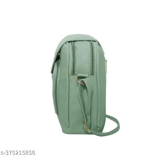 Green canvas sling bag with shoulder strap and zip closure
