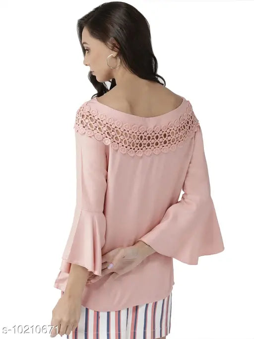Peach colored viscose rayon solid top, three-quarter sleeves for women's fashion, style quotient India