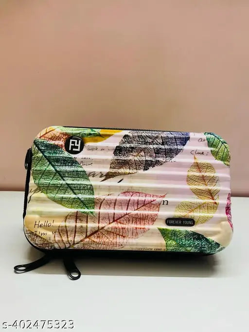 A blue and white floral slingbag with a single strap, likely made of fabric or leather