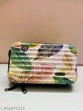 A blue and white floral slingbag with a single strap, likely made of fabric or leather