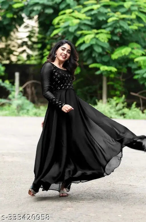 Black Georgette Apple Dress Embellished Net, heavy fox long sleeves, Indian hand-embroidery artistry on mannequin