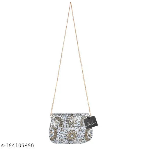 Silver metal sling bag with white mosaic details, handcrafted design, suitable for parties and events