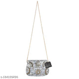 Silver metal sling bag with white mosaic details, handcrafted design, suitable for parties and events