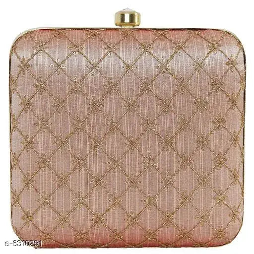 Pink quilted clutch with a gold clasp