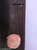 A pink and white striped crossbody sling bag for kids and girls