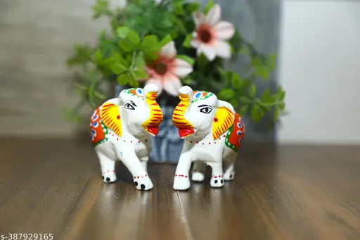 Handcrafted white paper mache elephant figurines, set of 2 for living room decor or gift - perfect for home, office, or temple. Ideal for wedding gifts, anniversaries, or festivals