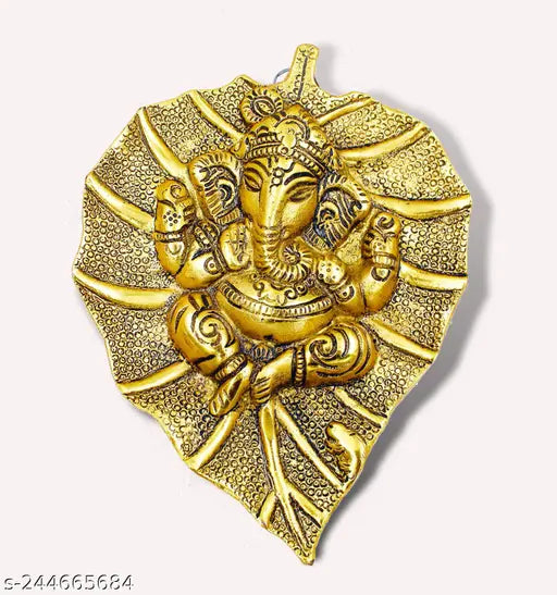 Golden, handcrafted Ganesh figurine on peepal leaf for home/office decor, 20x16x3 cm, Indian artistry