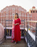 Red dupatta draped on a woman in a flared kurta, styled for ethnic wear