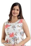 White flared rayon kurta with pink floral print, sleeveless and midi length, international women's fashion