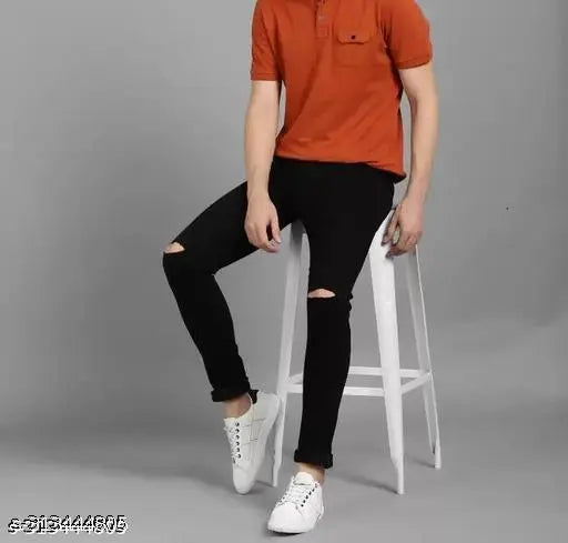 Men's black denim knee-cut jeans with ripped pattern, denim fabric. Explore trendy casual trousers by VYESH, size 28/30/32