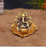 Metal Ganesh ji on leaf with diya idol, intricately detailed home decor showpiece for Diwali gifts. (12x8x8 cm, India origin)