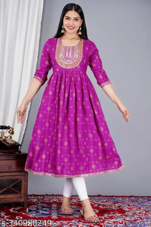 Purple rayon printed kurti for women, three-quarter sleeves, Indian ethnic fashion on display