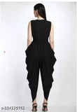 Black crepe dhoti jumpsuit, solid pattern women's fashion, latest printed Indian wear on mannequin