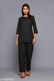 Trendy rayon women's night suit with three-quarter sleeves, printed net pattern on display