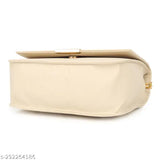Gold buckle slingbag in light beige fabric, with multiple pockets and a zip closure