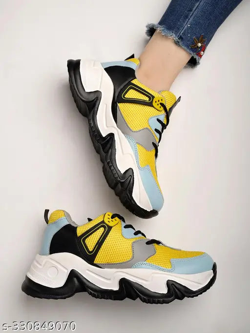 Yellow mesh and PU colorblocked sneakers by Shoetopia for girls' casual wear